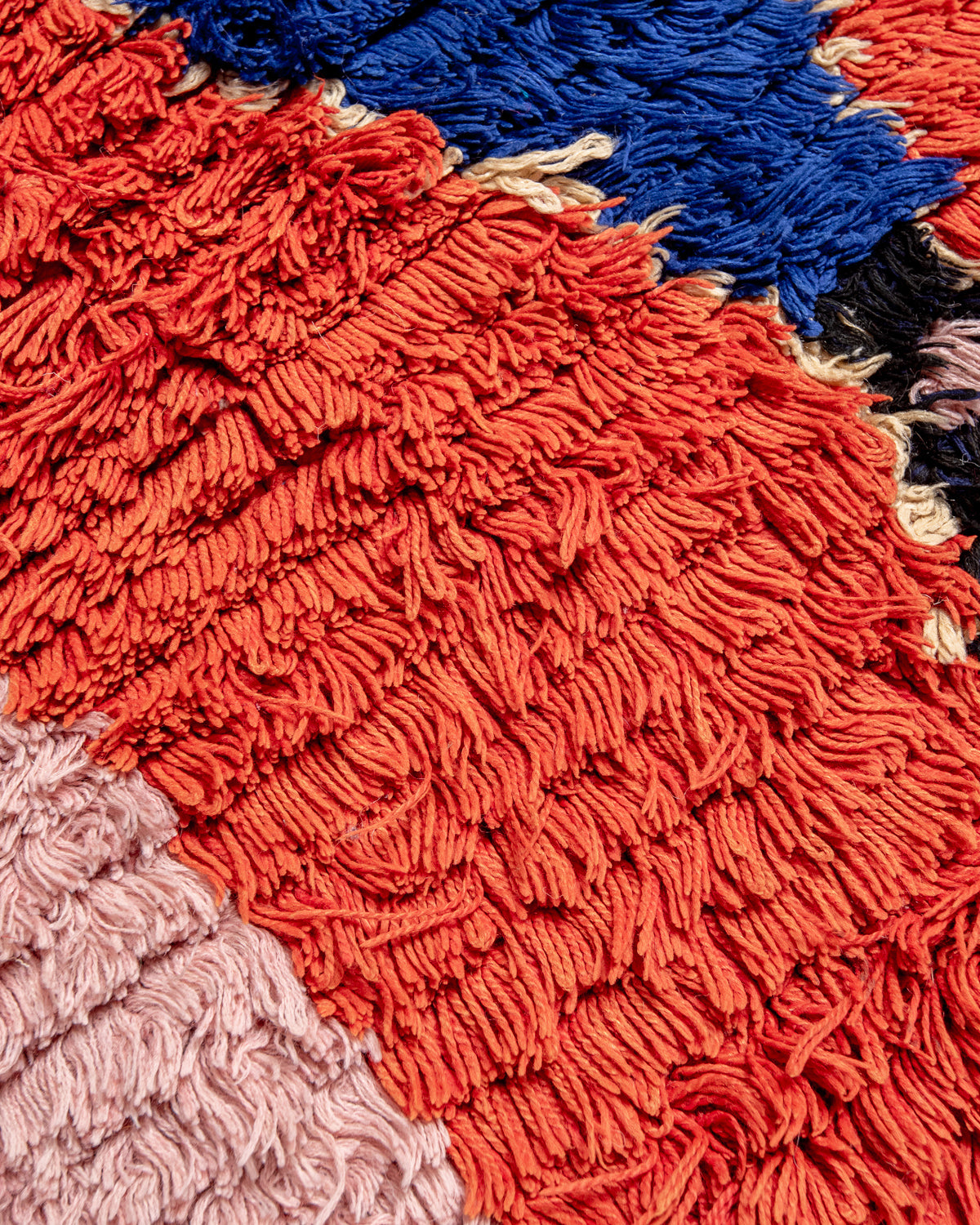 Modern designer vintage handcrafted Berber rug from Morocco. Boucherouite runner rug with beautiful colors and patterns.